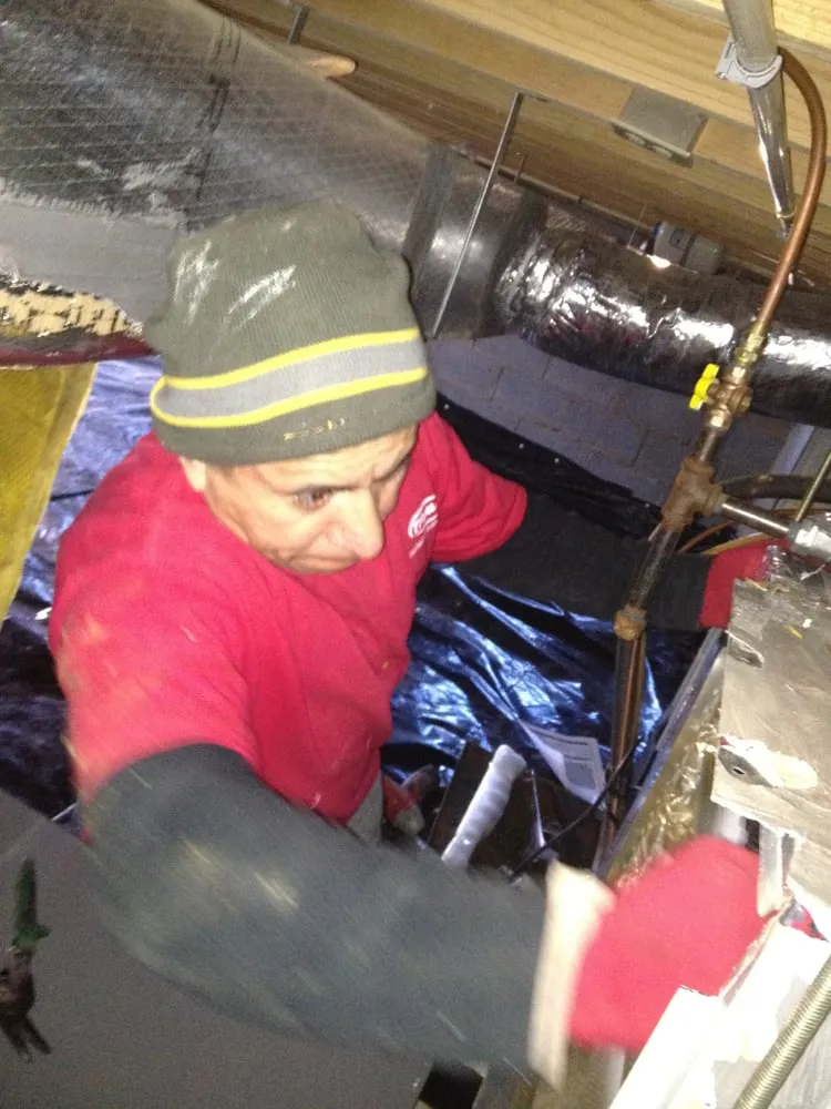 Slide of Travis Heating And Cooling