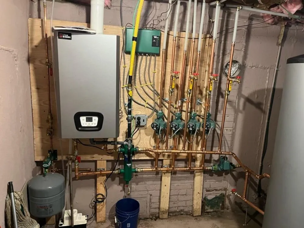 Slide of TT and CA Plumbing and Heating