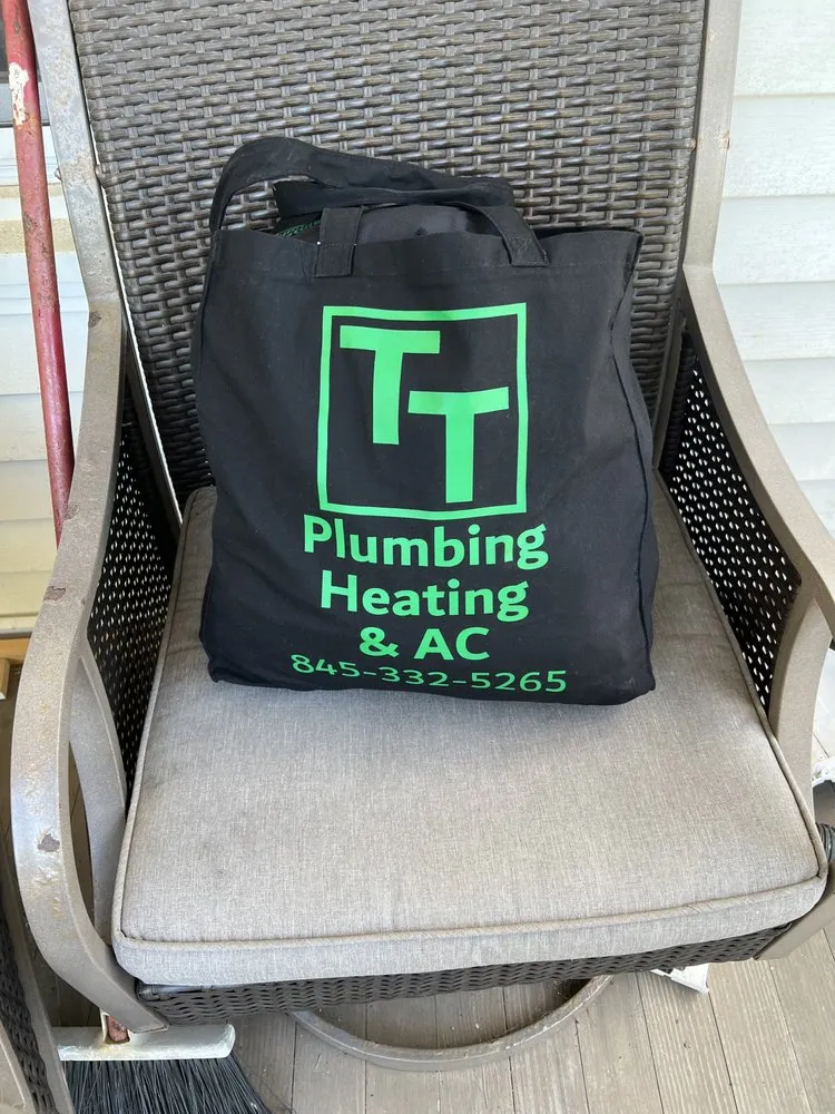Slide of TT Plumbing Heating and AC