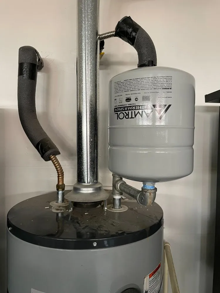 Slide of Two Brothers Water Heater Repair