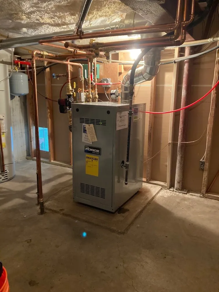 Slide of Ultimate Heating, Cooling, Plumbing & Electric