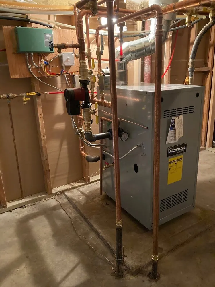 Slide of Ultimate Heating, Cooling, Plumbing & Electric