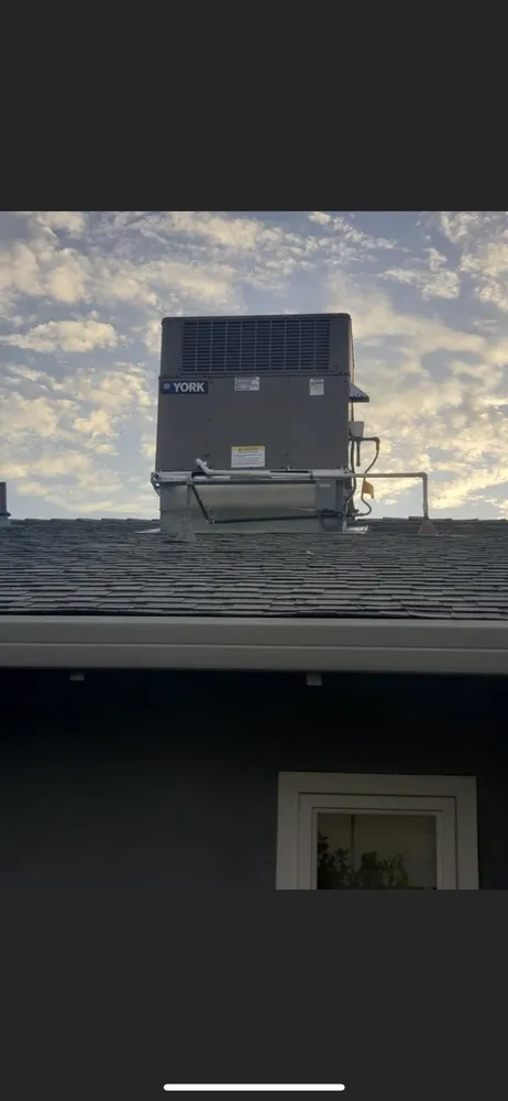 Slide of Umbrella Heating and Air