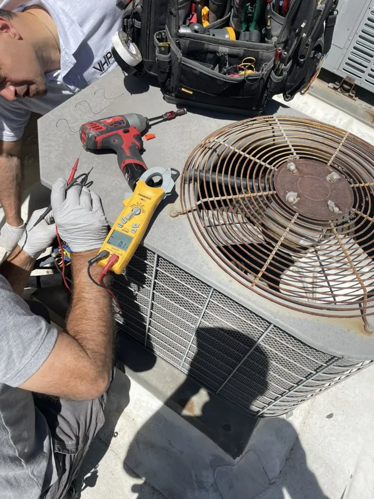 Slide of VHP Air Conditioning & Heating