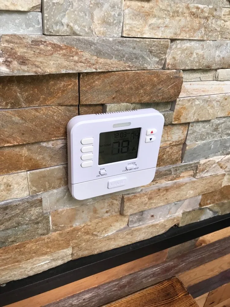 Slide of Village Green Air Conditioning