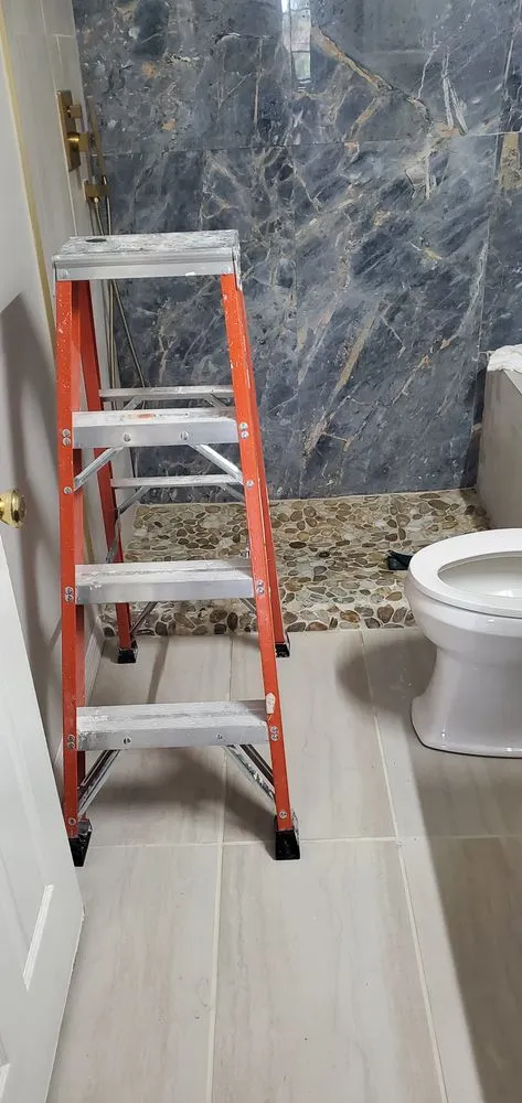 Slide of Vinnies Home Repairs Top To Bottom