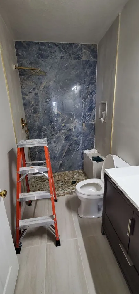 Slide of Vinnies Home Repairs Top To Bottom