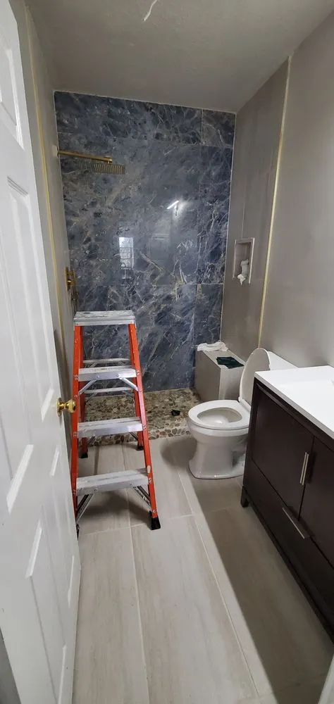 Slide of Vinnies Home Repairs Top To Bottom