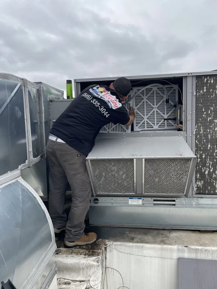 Slide of Warm or Breezy Heating & Cooling