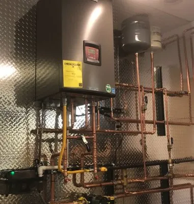 Wellman Heating & Air Logo