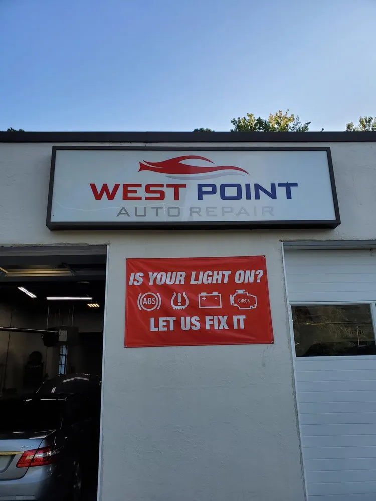 Slide of West Point Auto Repair