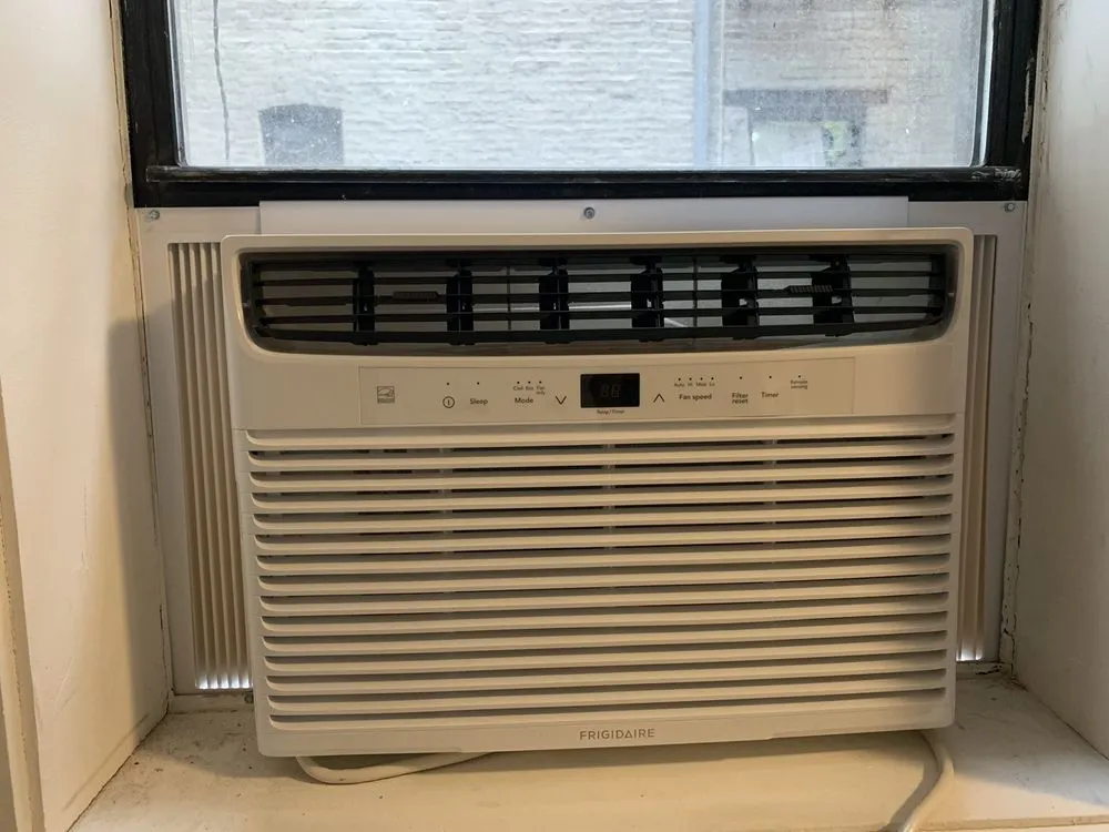 Slide of Window Air Conditioner Installation by SuperCoolNYC