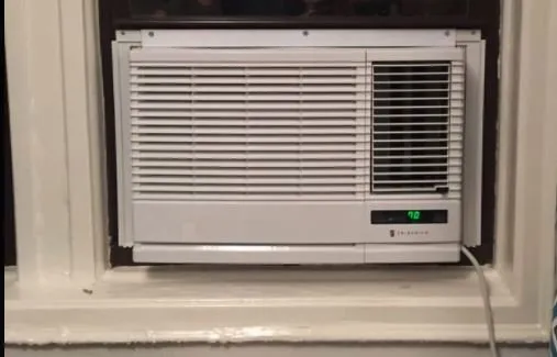 Slide of Window Air Conditioner Installation by SuperCoolNYC