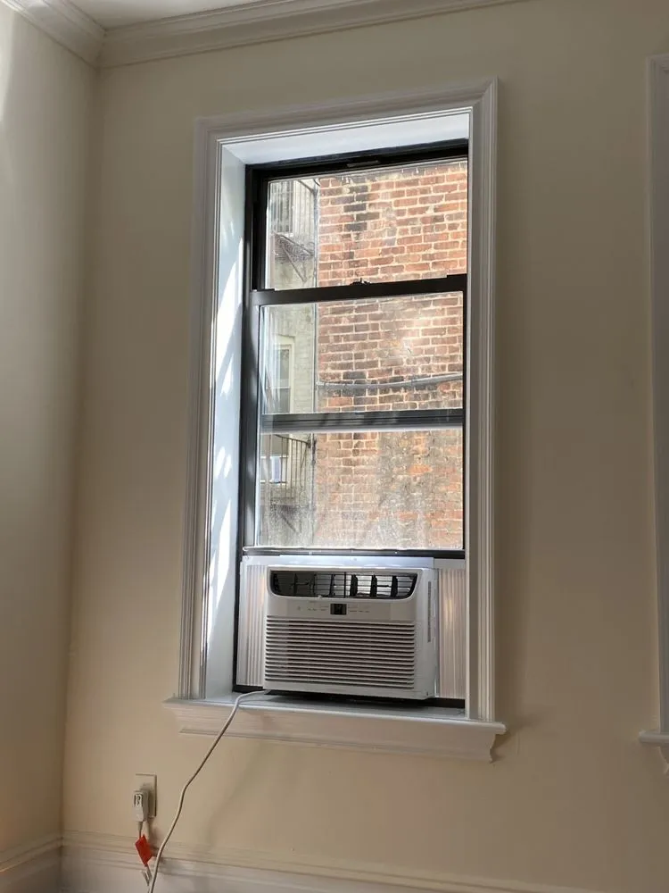 Slide of Window Air Conditioner Installation by SuperCoolNYC