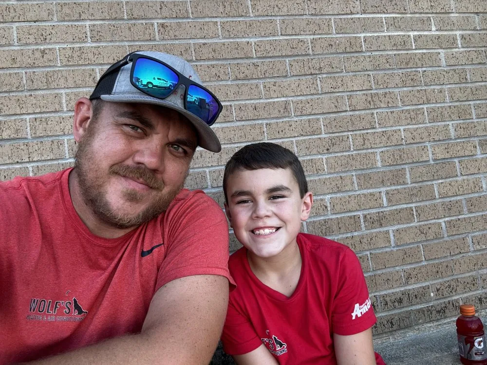 Slide of Wolf's Heating & Air Conditioning