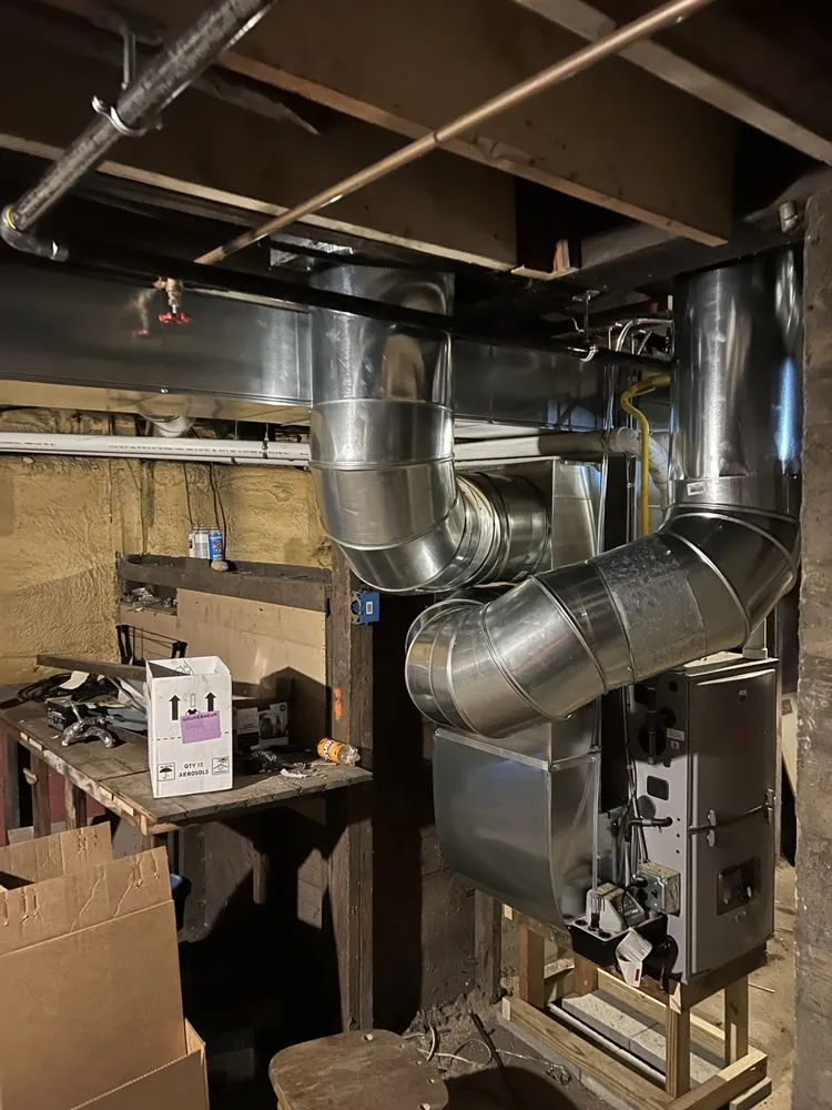 Slide of Wollman Heating and Plumbing