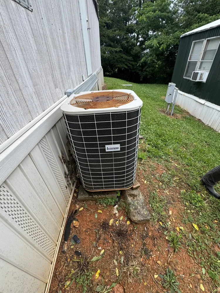 Slide of Woodard Heating And Air