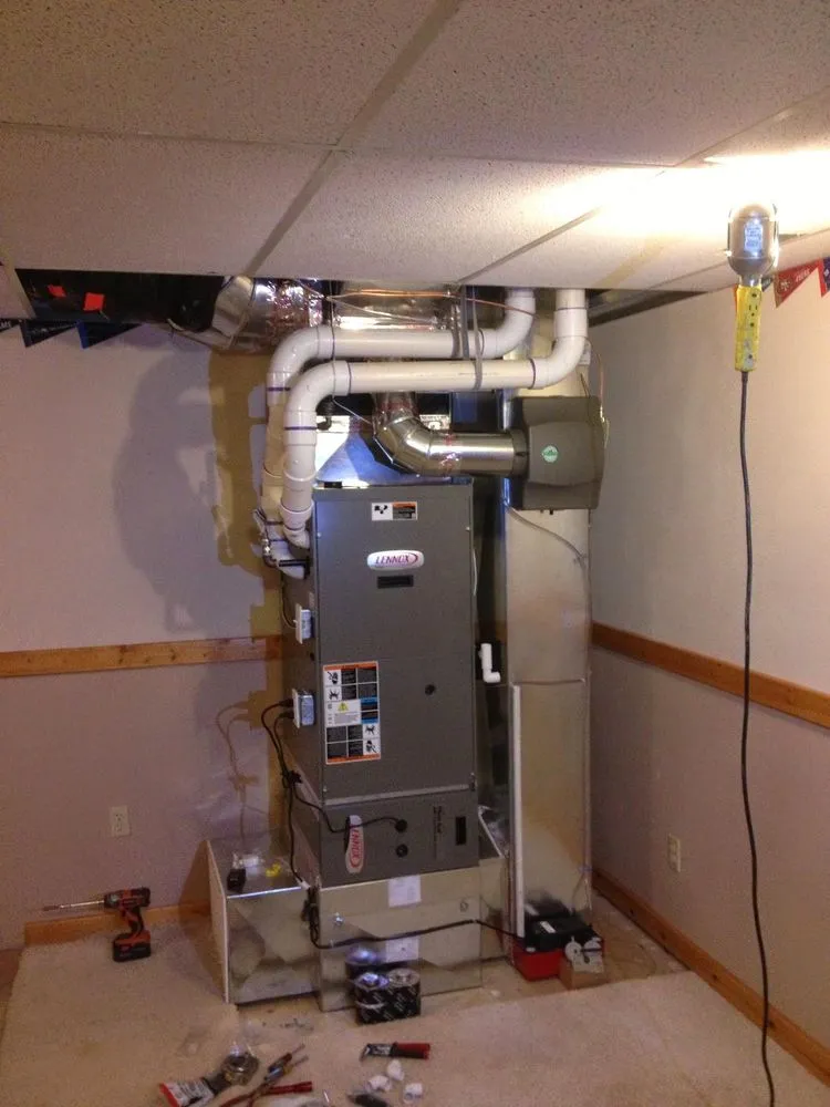 Slide of Woodland Plumbing, Heating & Air Conditioning