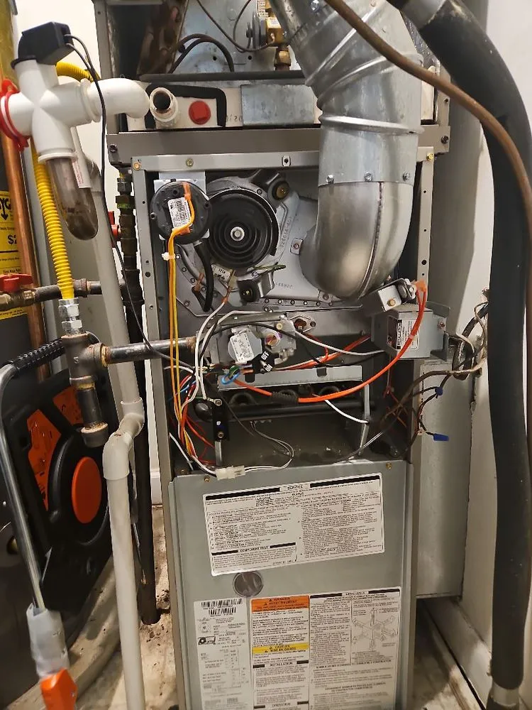 Slide of Woods Family Heating & Air Conditioning