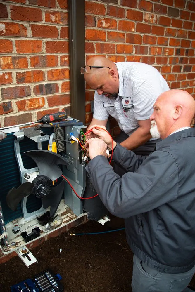 Slide of Woods Family Heating & Air Conditioning