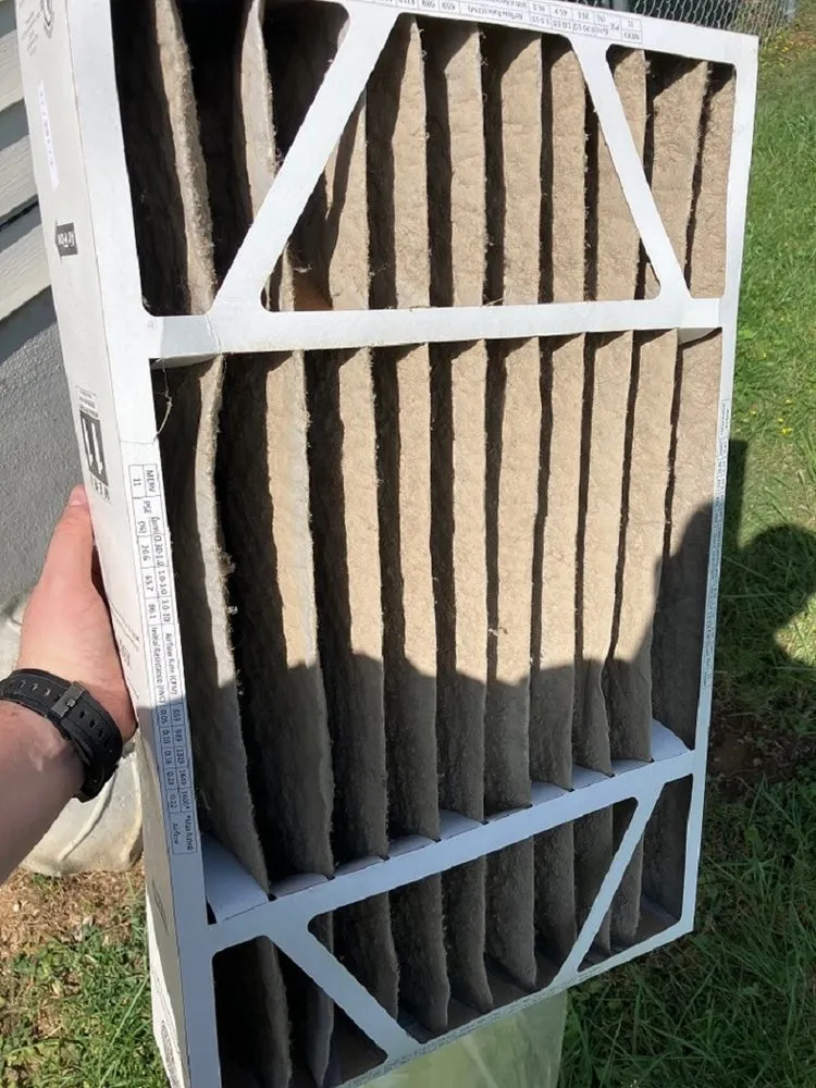 Slide of Woods Family Heating & Air Conditioning