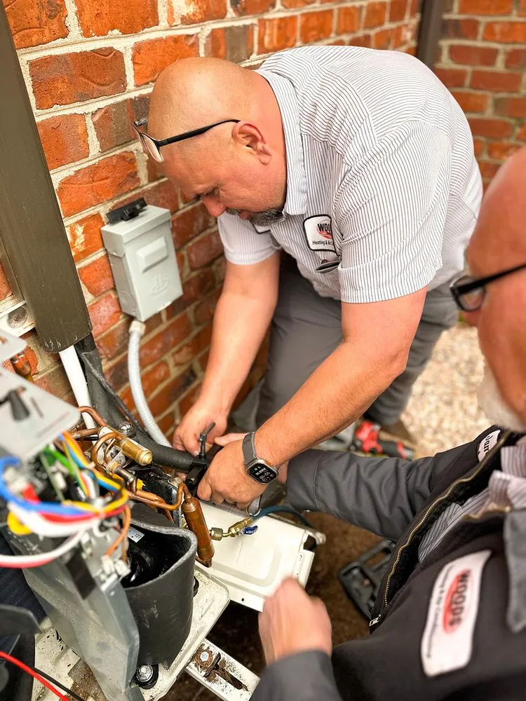 Slide of Woods Family Heating & Air Conditioning