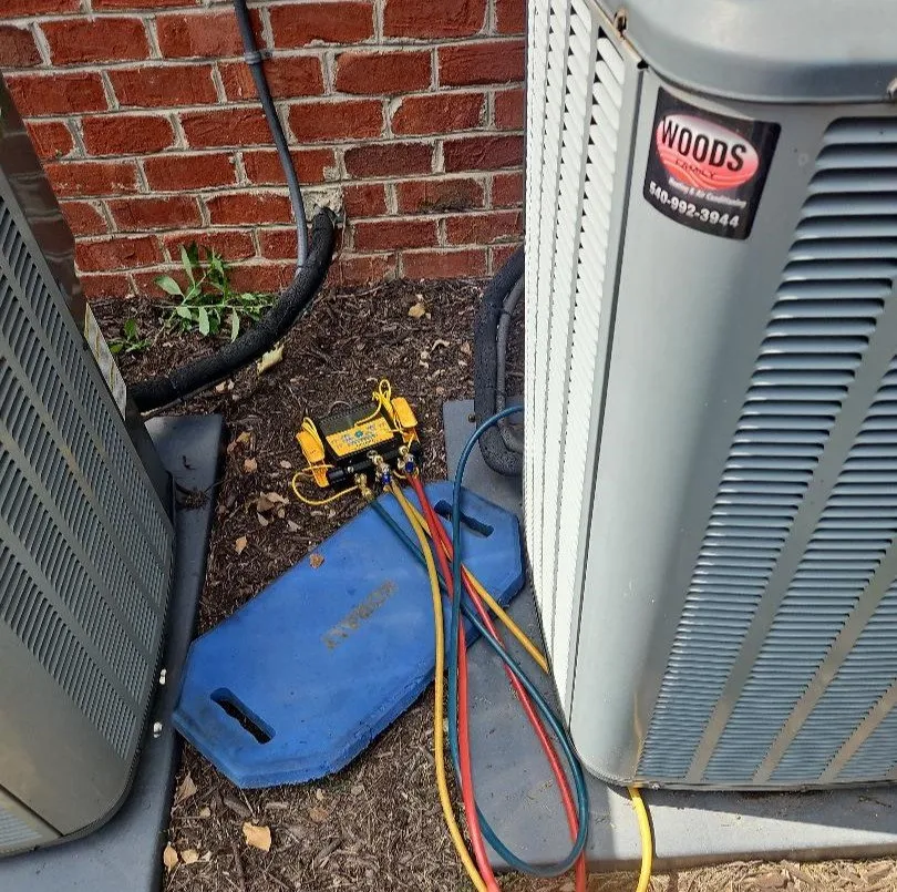 Slide of Woods Family Heating & Air Conditioning