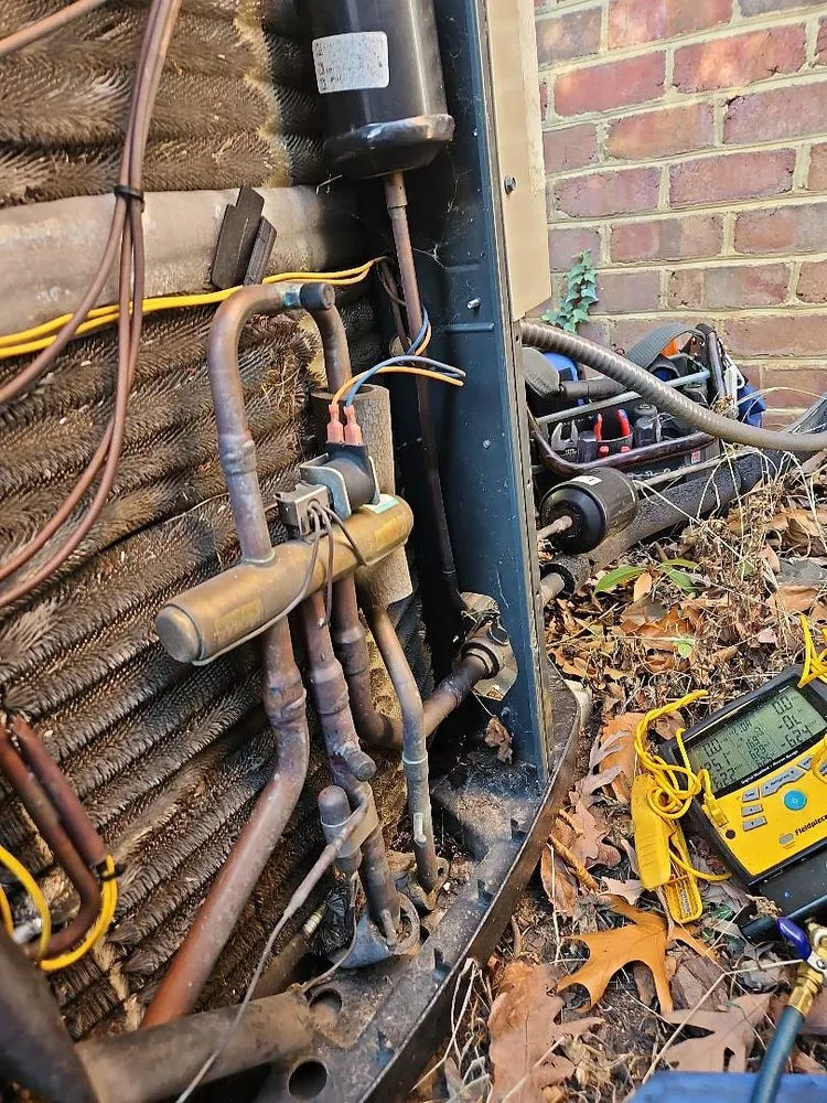 Slide of Woods Family Heating & Air Conditioning