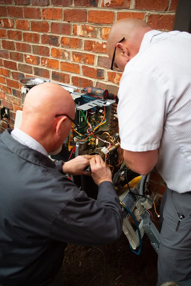 Slide of Woods Family Heating & Air Conditioning