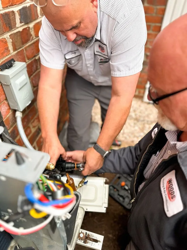 Slide of Woods Family Heating & Air Conditioning