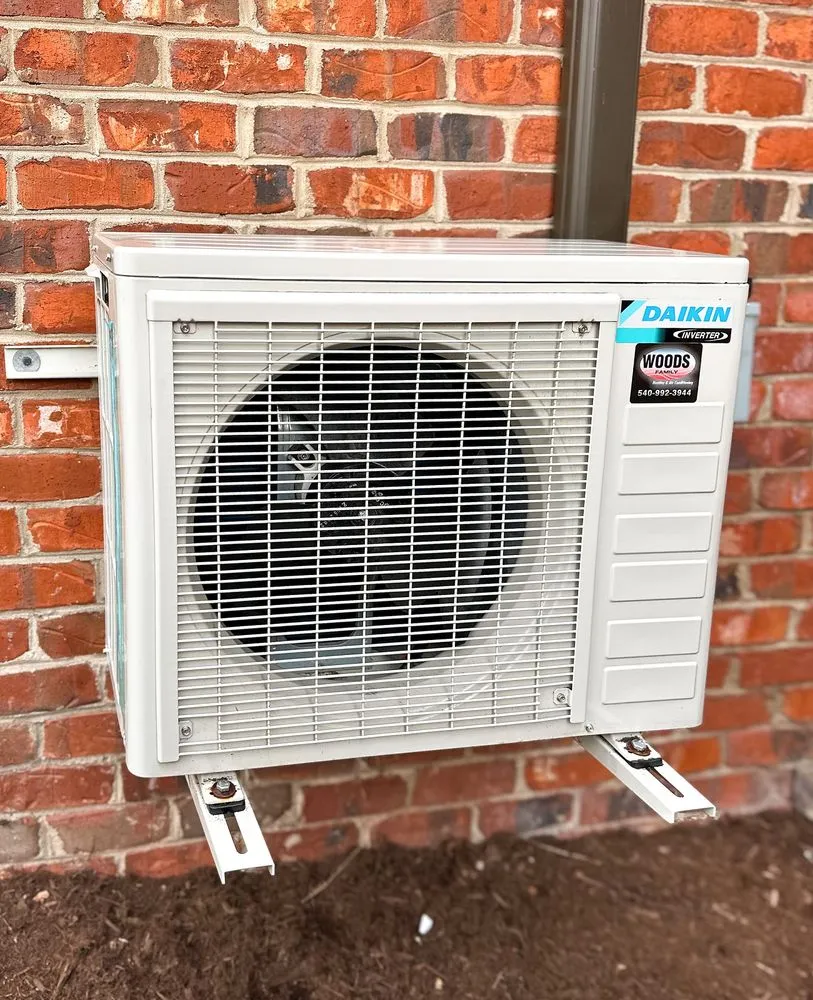 Slide of Woods Family Heating & Air Conditioning