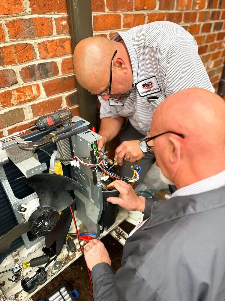 Slide of Woods Family Heating & Air Conditioning