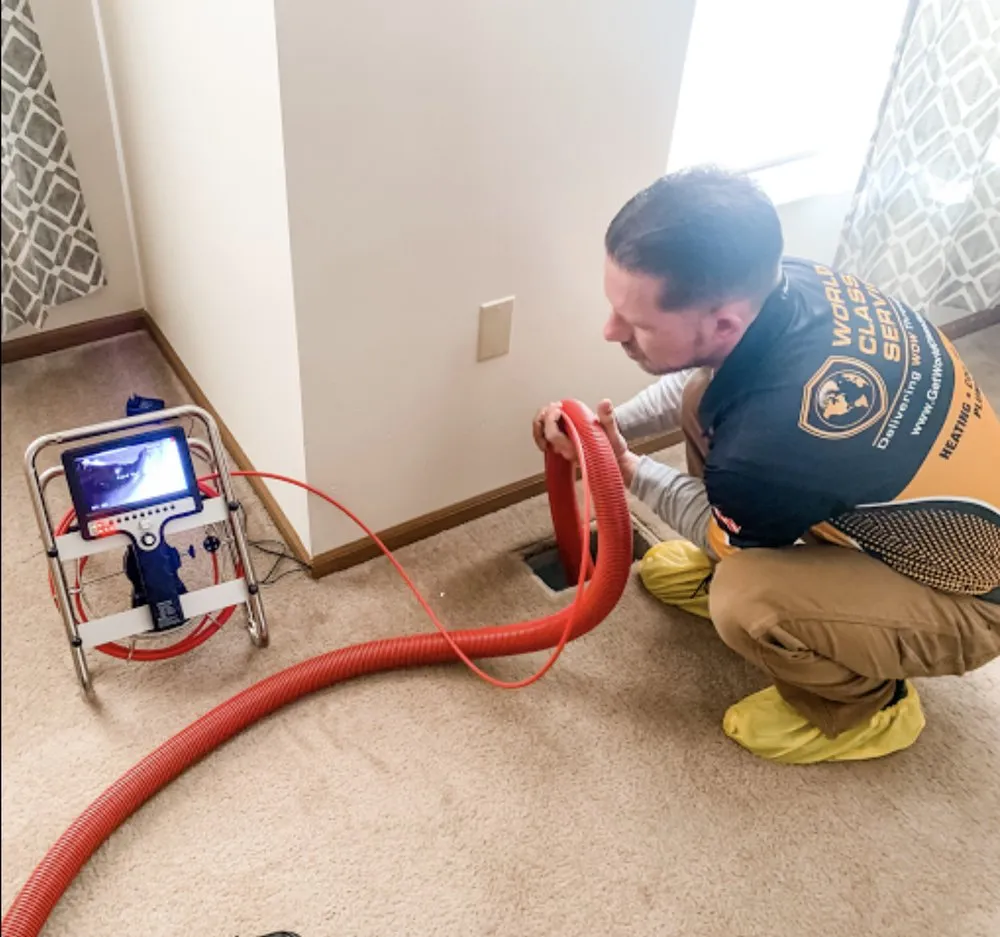 Slide of World Class Services Heating, AC, & Plumbing Repair