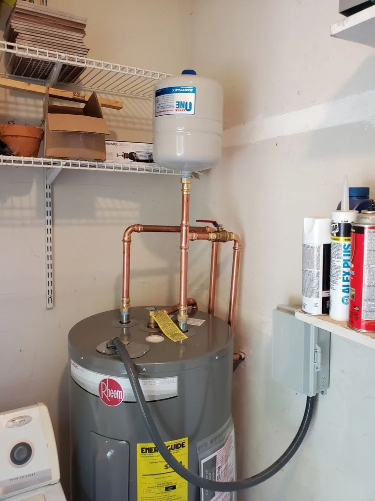 Slide of Xtra Mile Cooling, Plumbing & Electric