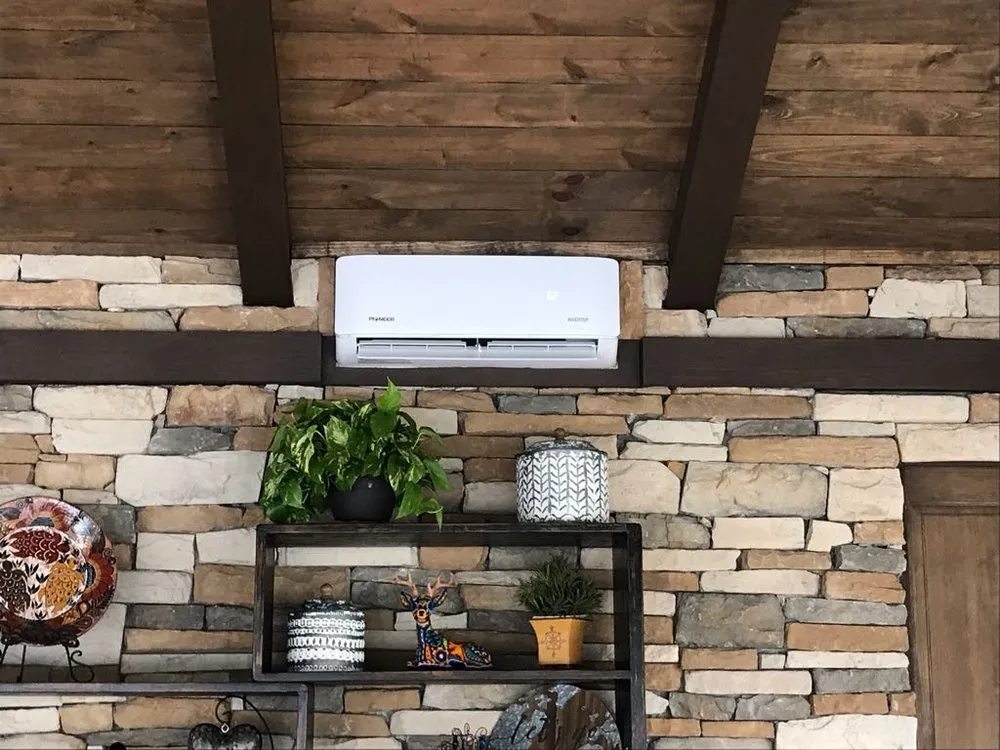 Slide of Y2K Air Conditioning & Heating Plus