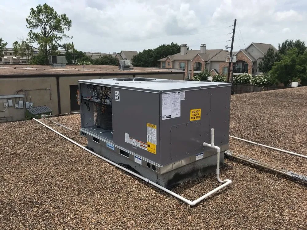 Slide of Y2K Air Conditioning & Heating Plus