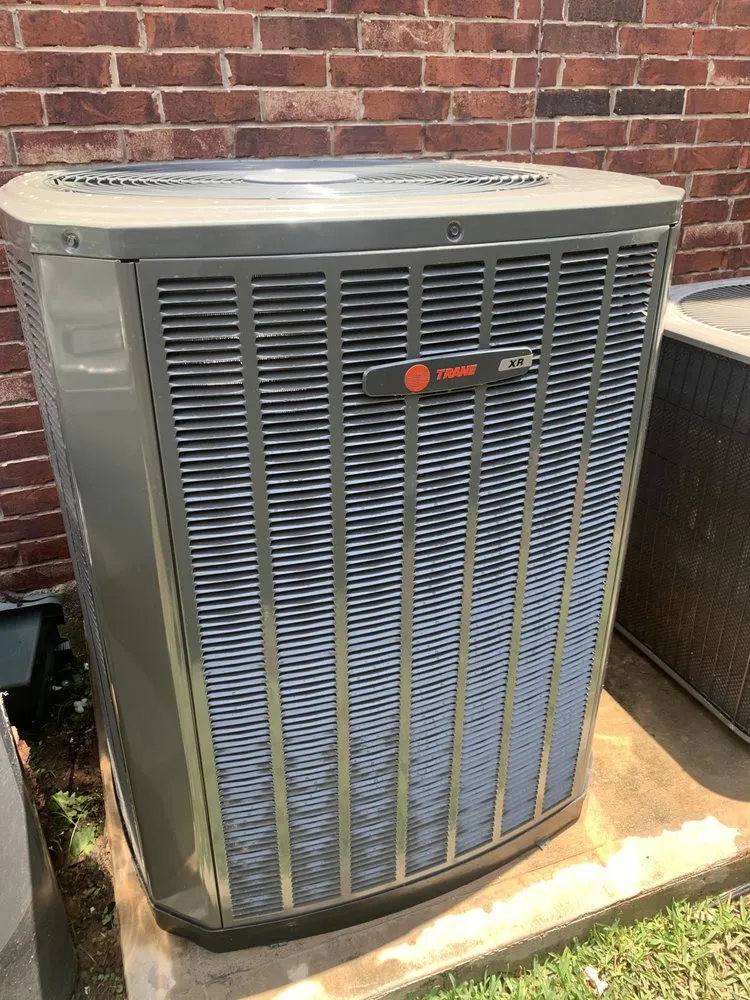 Slide of Y2K Air Conditioning & Heating Plus