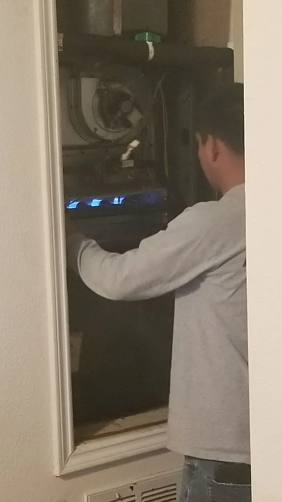 Slide of Y2K Air Conditioning & Heating Plus