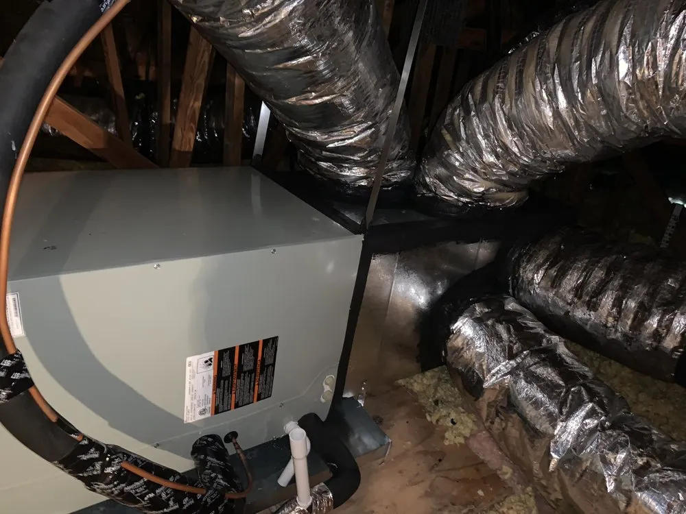 Slide of Y2K Air Conditioning & Heating Plus