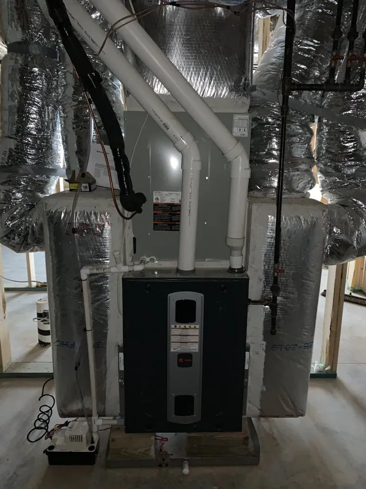 Slide of Y2K Air Conditioning & Heating Plus