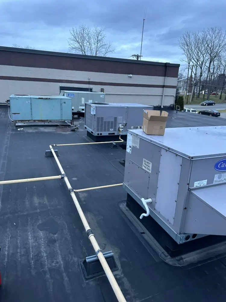 Slide of YurTek - Trudeau HVAC and Property Management